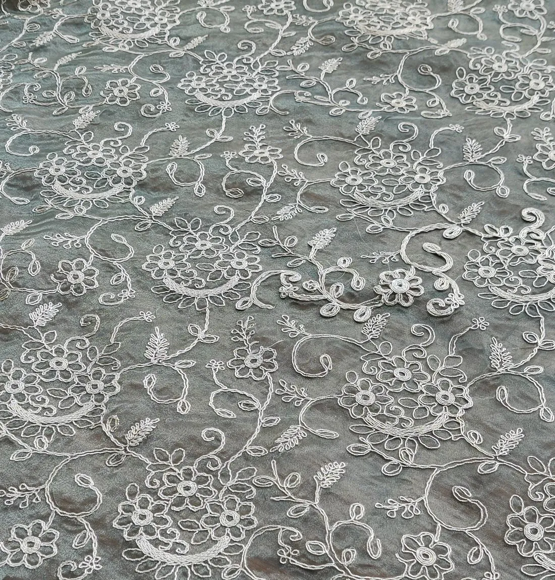 Green Floral Self Embroidered Organza Fabric