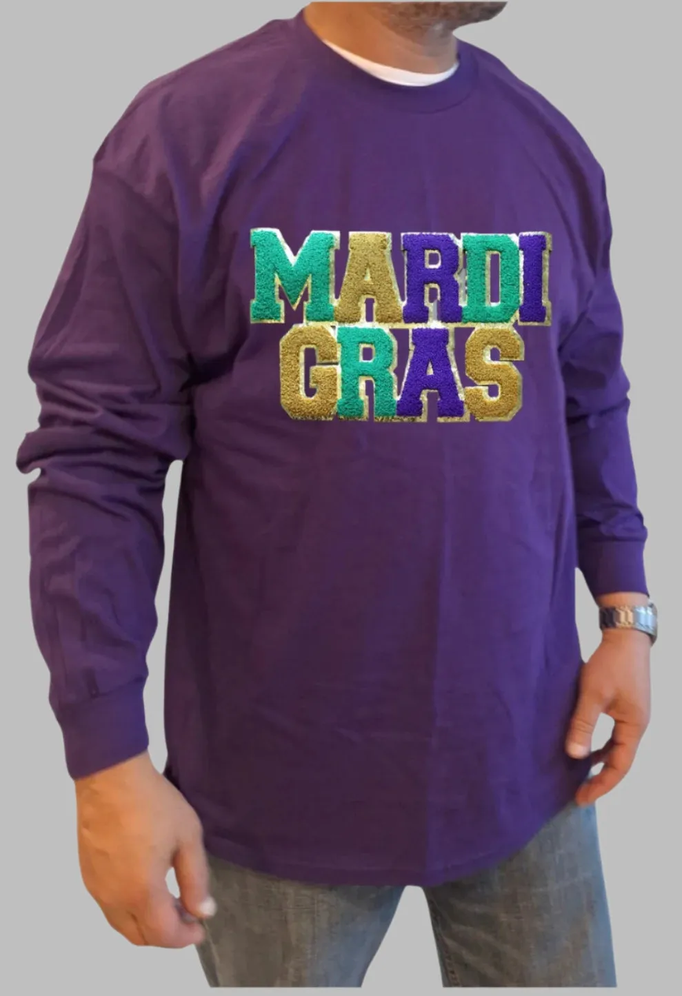 "Mardi Gras Magic: Purple Long Sleeve T-Shirt with Grand Embroidered Patch"